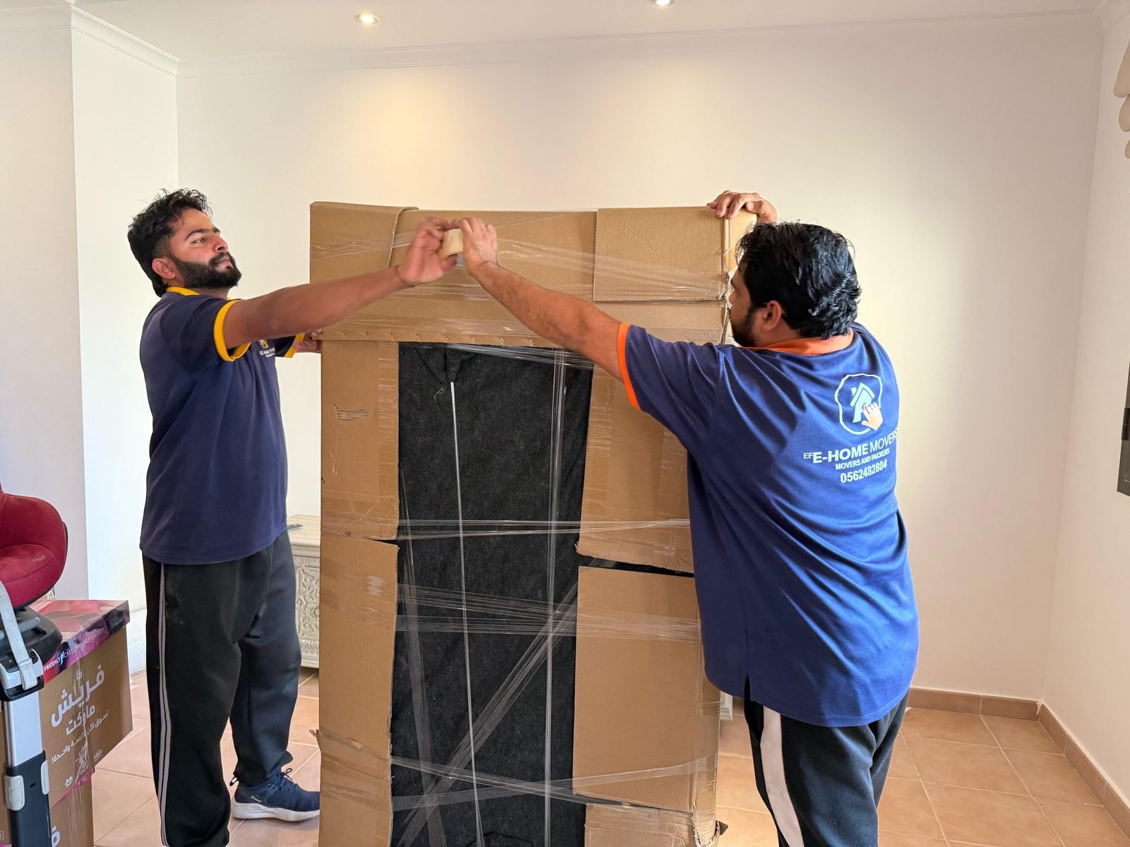 Villa movers Dubai building a custom carton around a wardrobe
